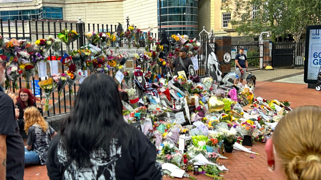 Fans lay tributes to Ozzy Osbourne on the Black Sabbath Bench in Birmingham City Centre.